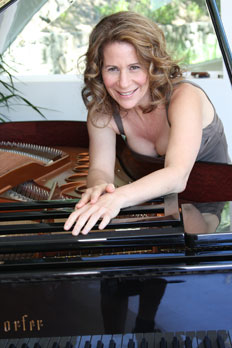 Photo of Mariah Parker on piano